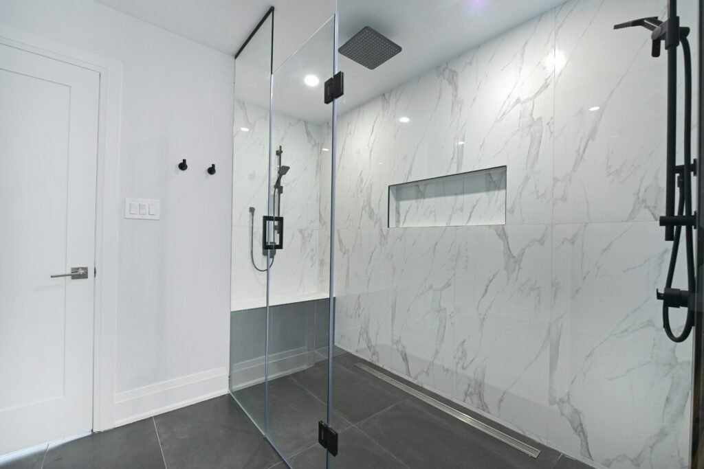 Frameless glass shower door installed by Middletown Bath Co.